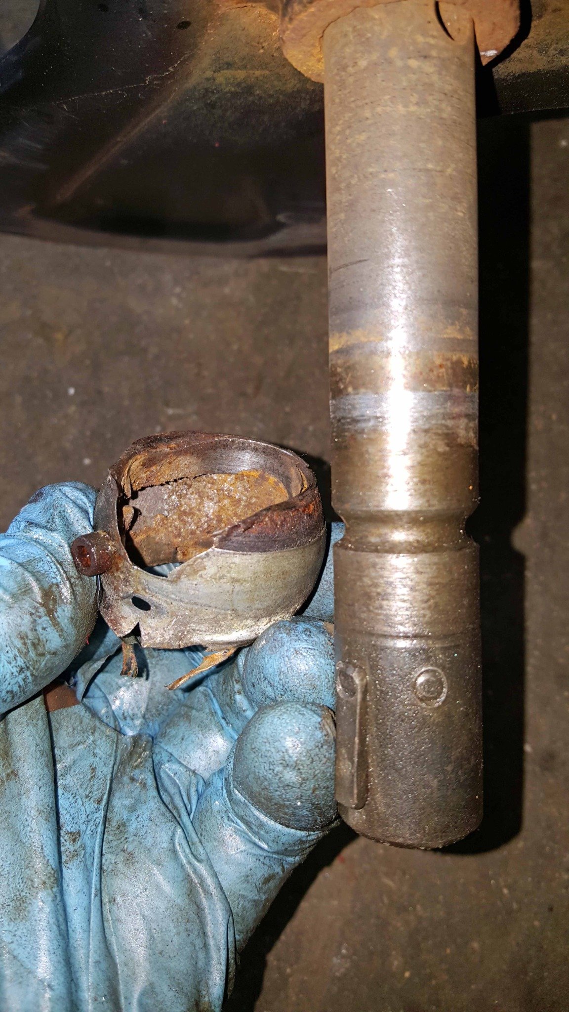 Before repair: worn auger input shaft on an older Toro snowblower