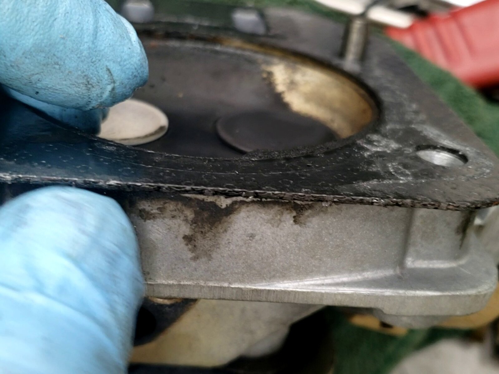 Damaged area of a Briggs and Stratton engine head gasket